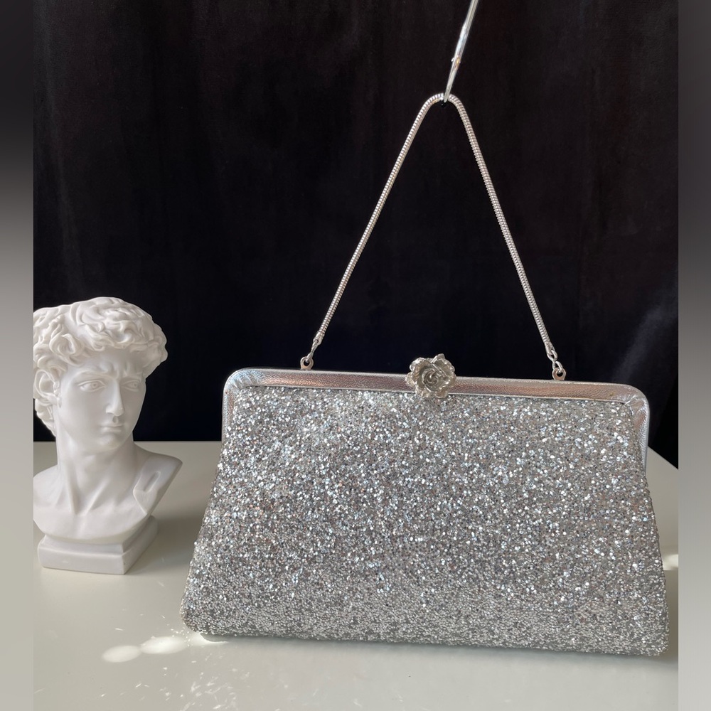 Vintage metallic silver clutch with rose details